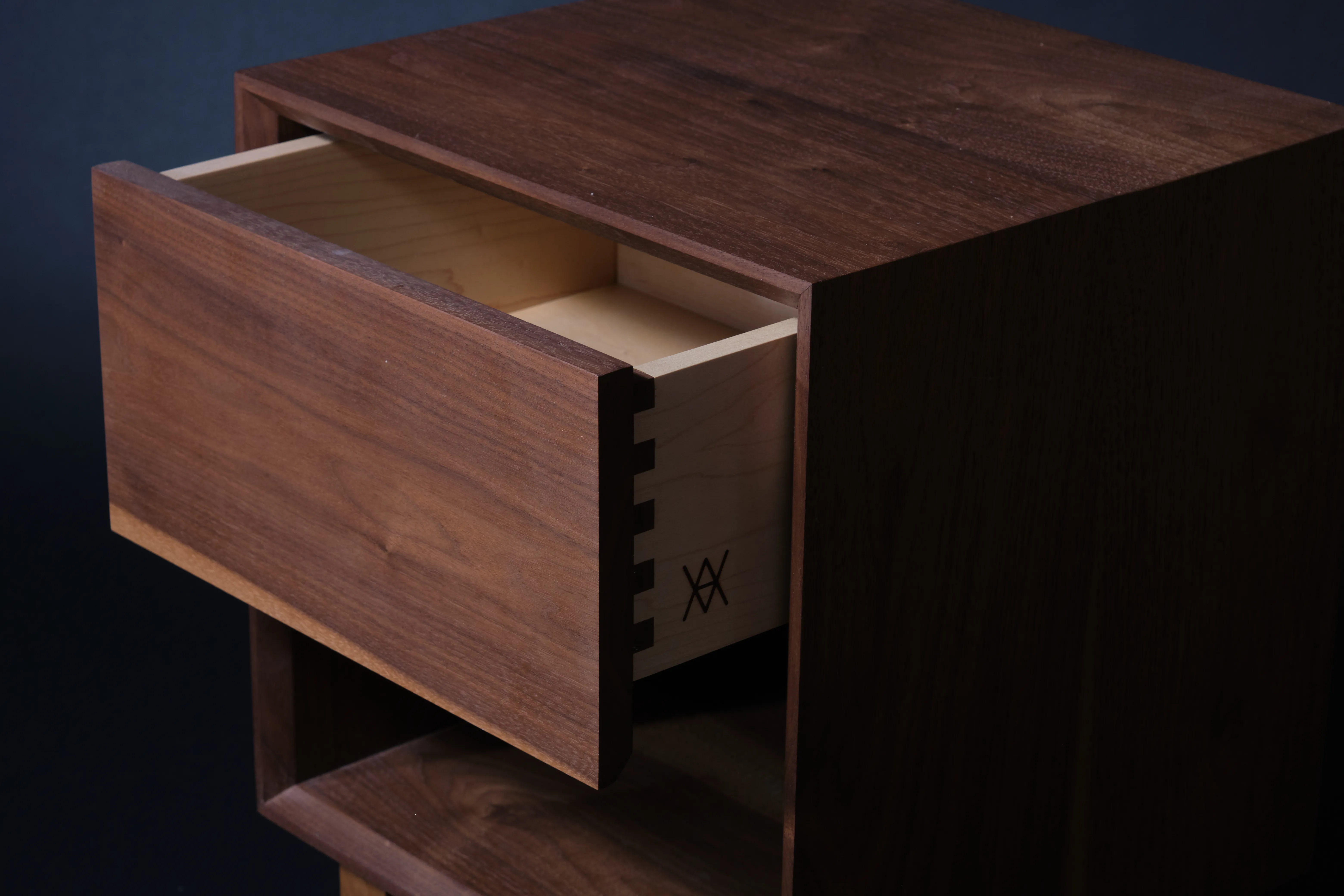 maple drawers so things in drawer are easier to find, and an opportunity to highlight the contrast in some box joints