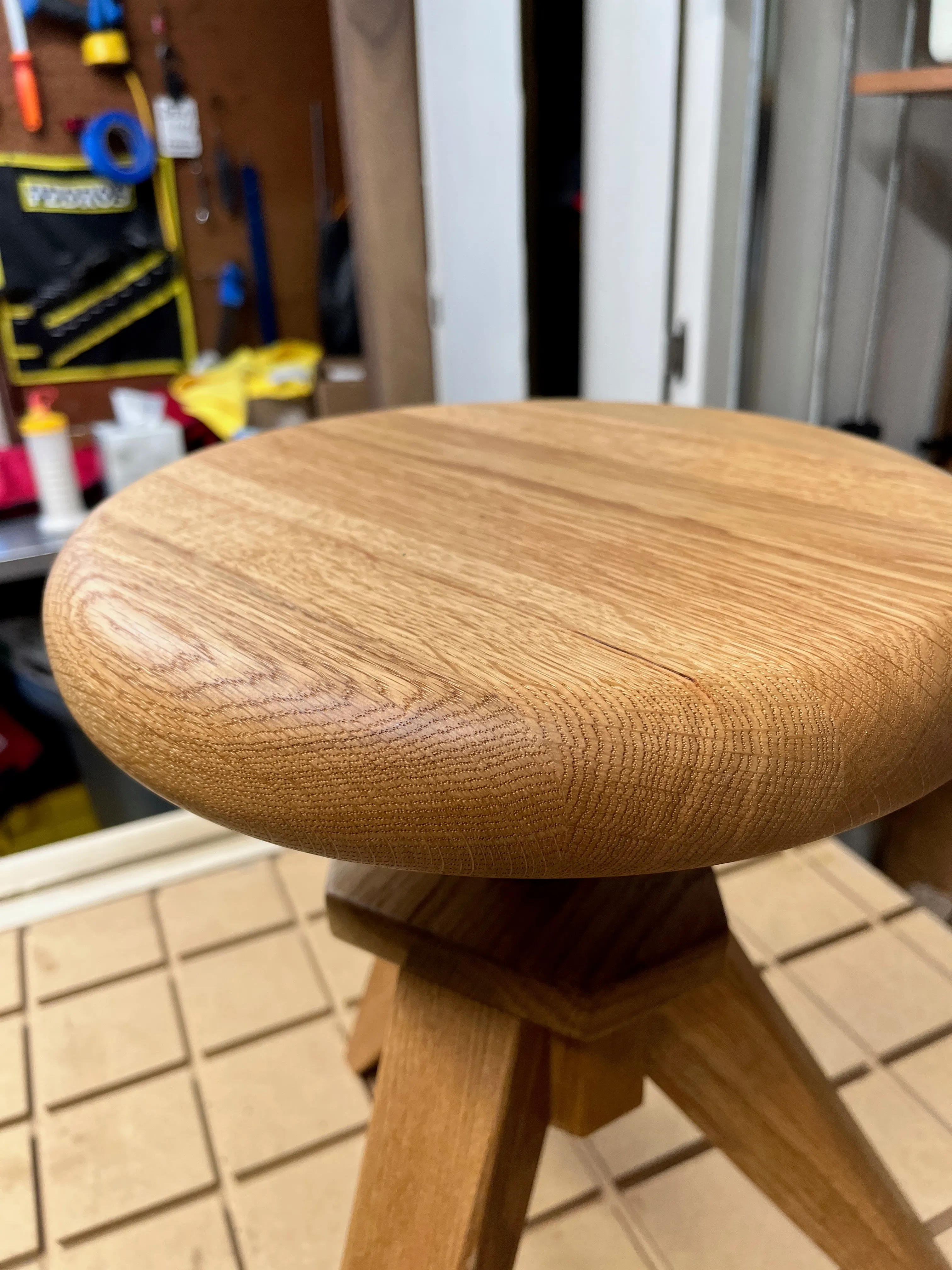 Large radius on stool top for comfort while potting